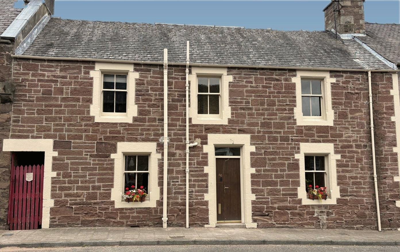 Sundial, Muthill, freshly restored stone and sash windows